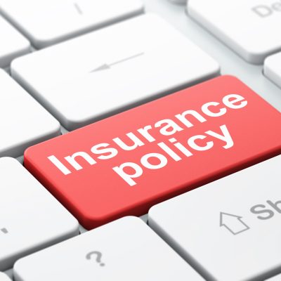 Insurance concept: computer keyboard with word Insurance Policy, selected focus on enter button background, 3d render